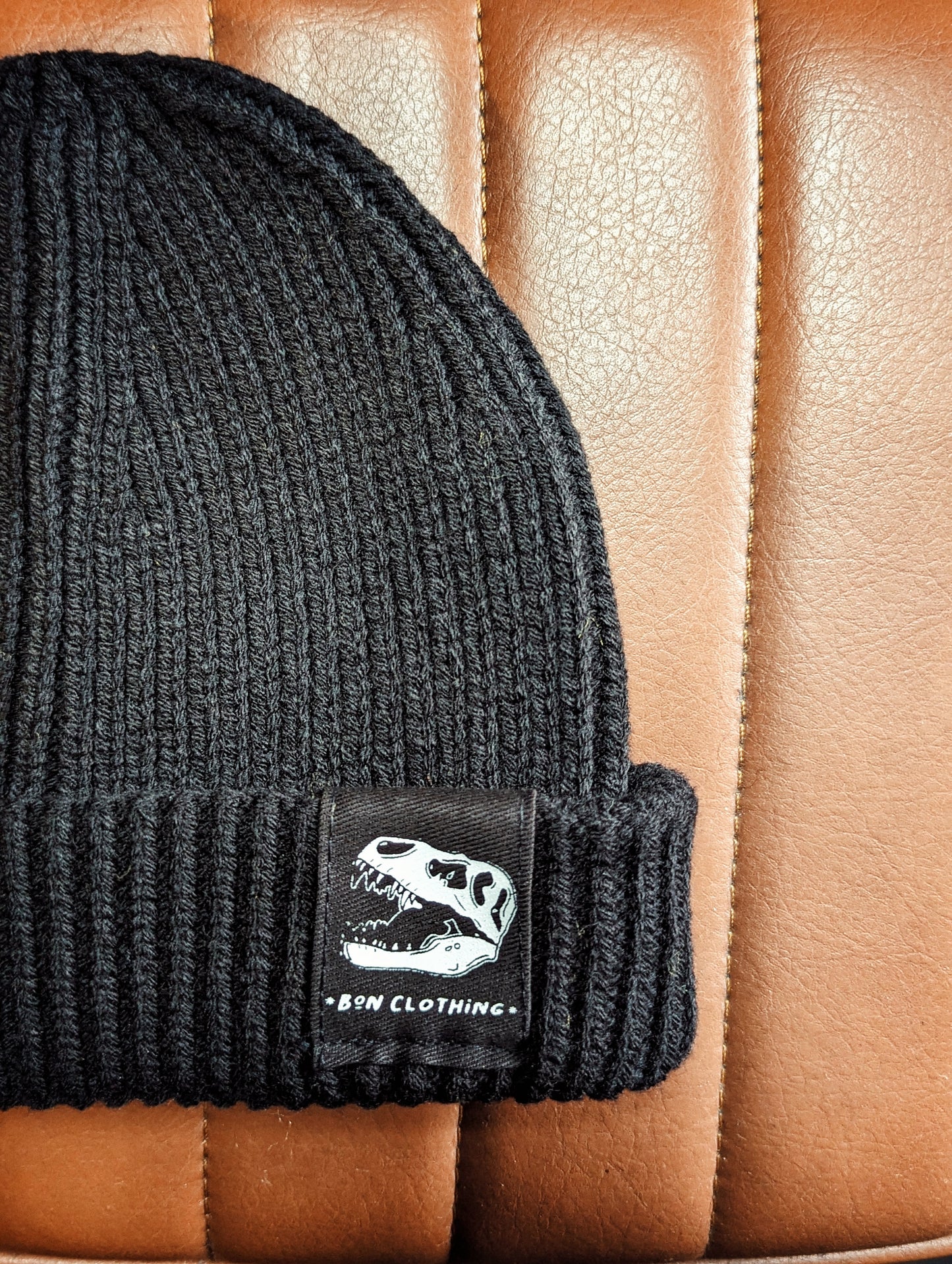 RECYCLED, ORGANIC HARBOUR STYLE BEANIES WITH T-REX PATCH.