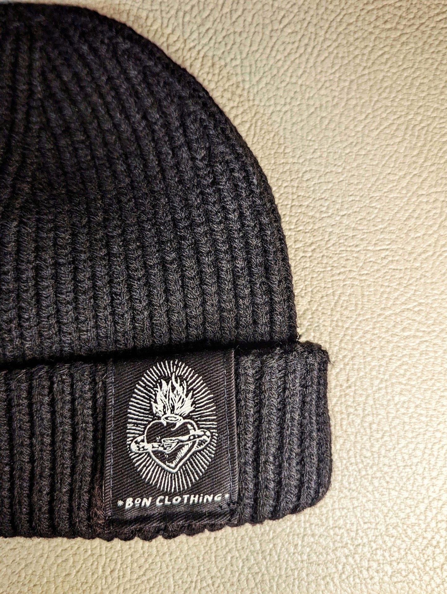 RECYCLED, ORGANIC HARBOUR STYLE BEANIES WITH SACRED HEART PATCH.